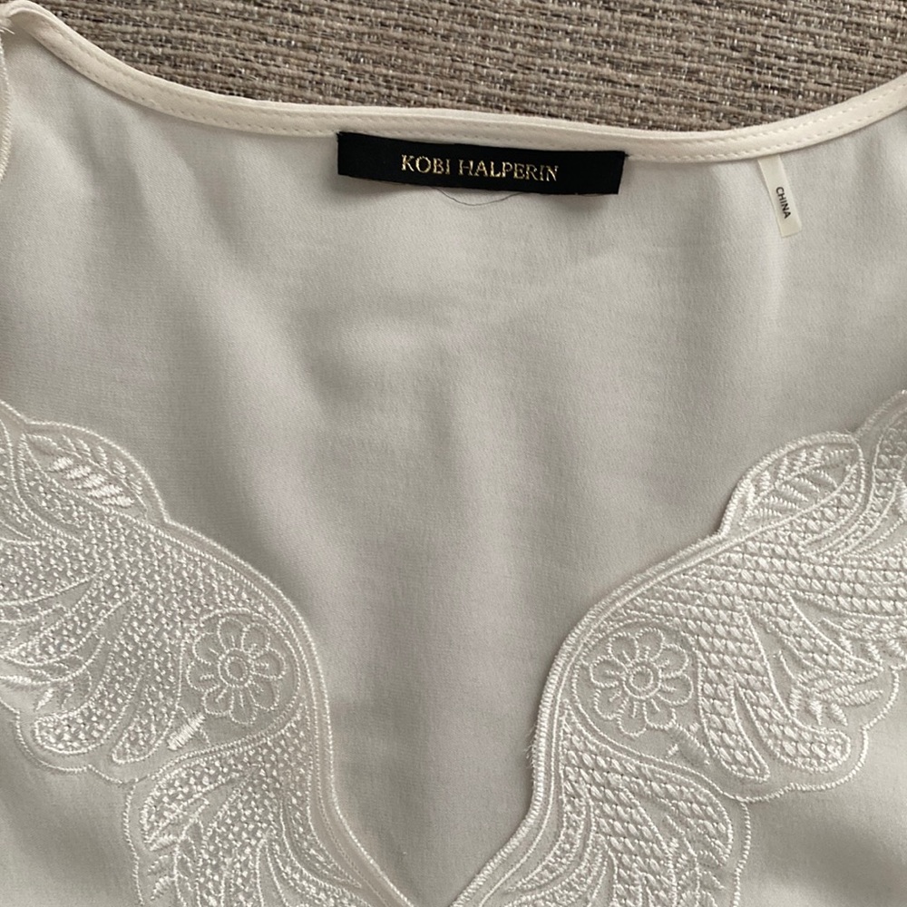 Ivory silk blouse with beautifully detailed sleeves